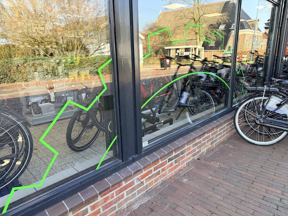 Fietsservice De Vries raambelettering