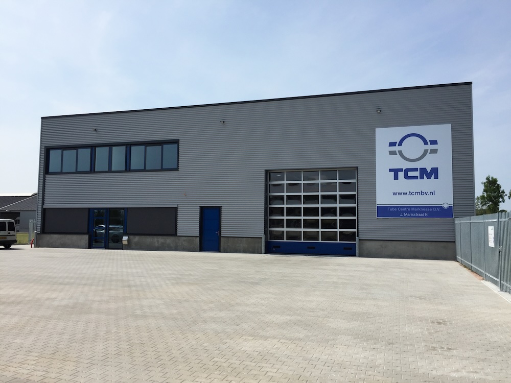 TCM spandoek